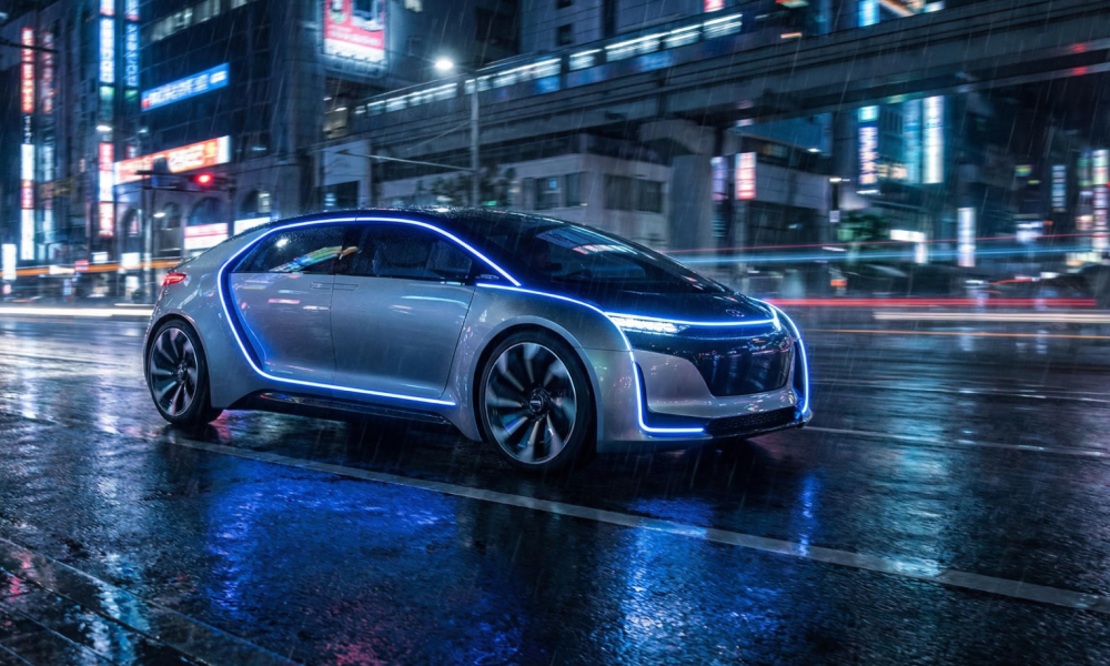 image of vehicles at night on a wet street