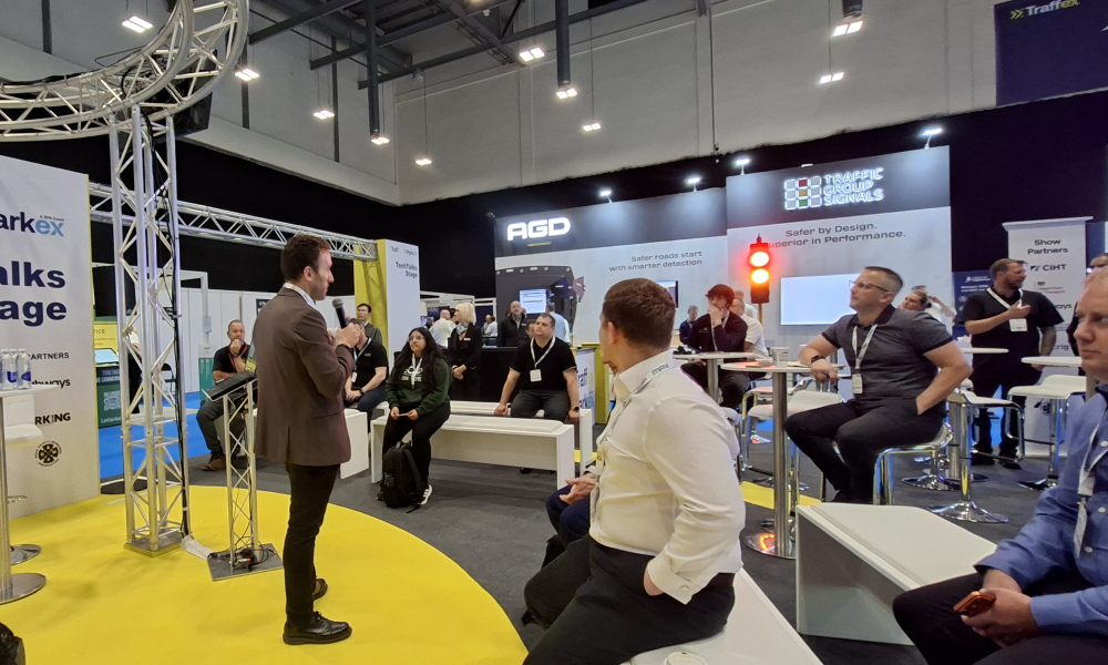 Image of Max Sugarman's keynote at TechTalks Traffex about ITS UK's initiative Stuck on Red 